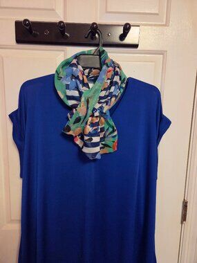 Royal blue blouse with infinity scarf.